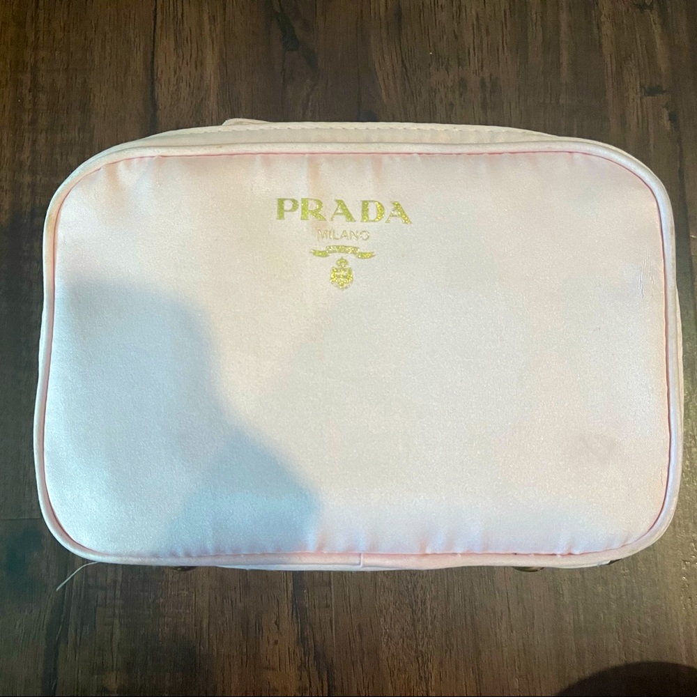 Prada make up/ cosmetic bag. Light pink with gold zipper and logo.